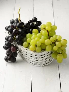 Grapes in baske Stock Photos