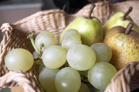 Grapes in a basket Stock Photos