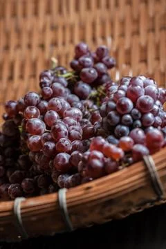 Grapes in a basket Stock Photos