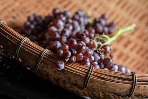 Grapes in a basket Stock Photos