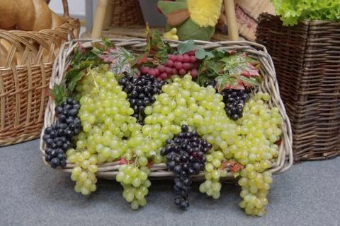 Grapes in a basket Stock Photos