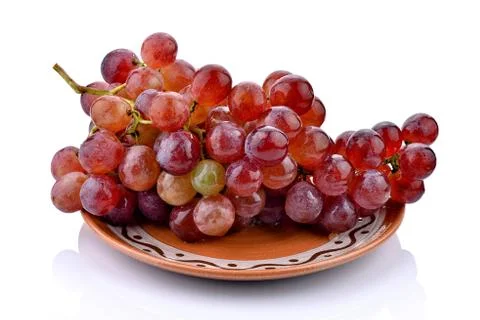 Grapes on a ceramic plate Foto stock