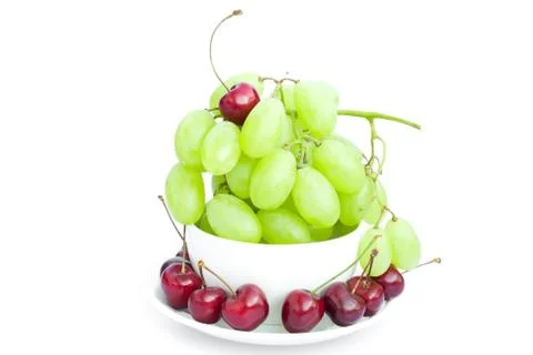 Grapes cherry in the cup is isolated on white 스톡 사진