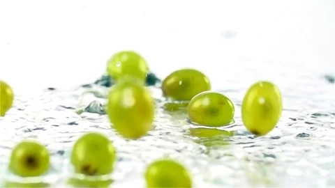 Grapes  falling in water Stock Footage 77076584