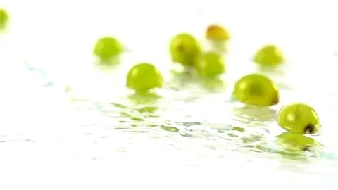 Grapes  falling in water Stock Footage 77076600