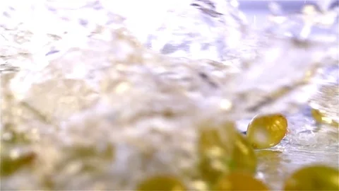 Grapes  falling in water Stock Footage 77076631