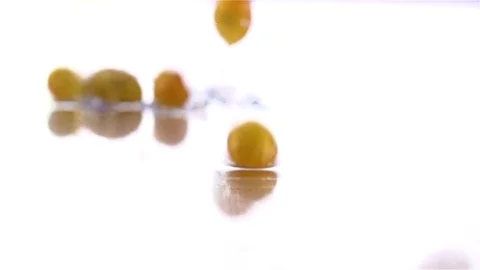 Grapes  falling in water Stock Footage 77076649