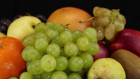 Grapes, orange, grapefruit and apples Stock Footage 124193402