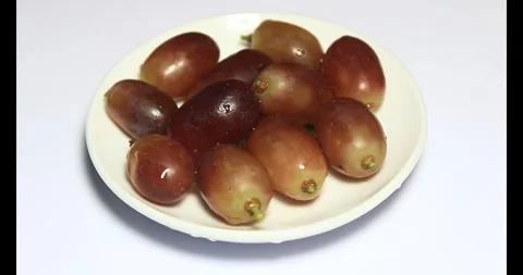Grapes on a plate Stock Footage 293086834