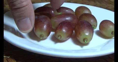 Grapes on a plate Stock Footage 293087332
