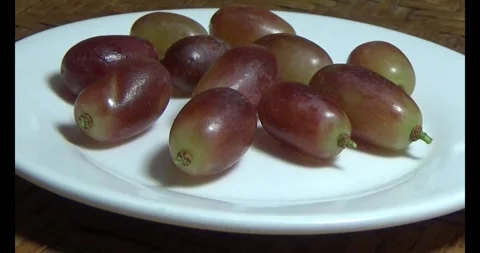 Grapes on a plate Stock Footage 293087373