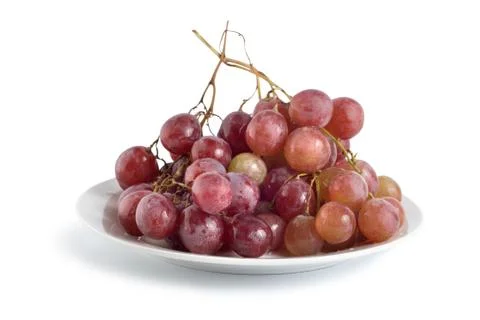 Grapes in a plate Stock Photos
