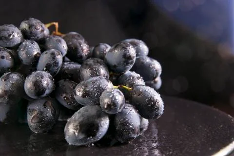 Grapes on the plate Stock Photos