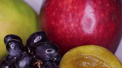 Grapes, plum and red apple  Stock Footage 81033727