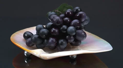 Grapes Presented on a Seashell. Video stock 57485468