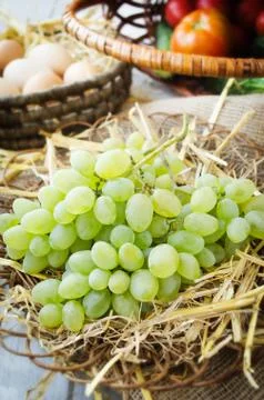 Grapes on a straw bedding Stock Photos