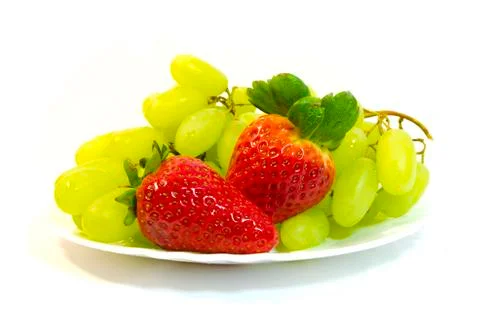 Grapes with strawberry Stock Photos