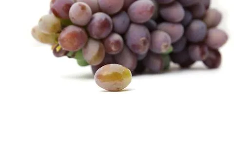 Grapes on white background Stock Photos