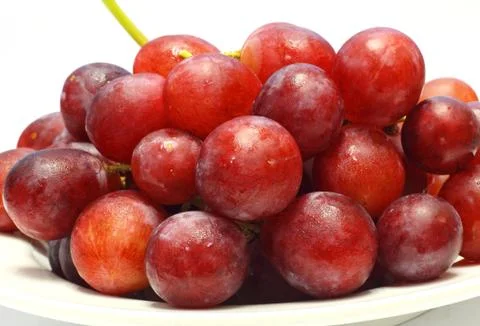Grapes on white background Stock Photos