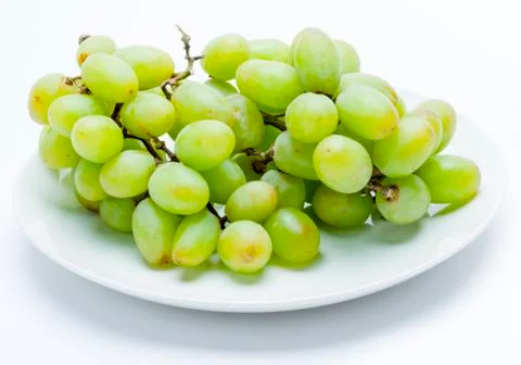 Grapes on white background Stock Photos