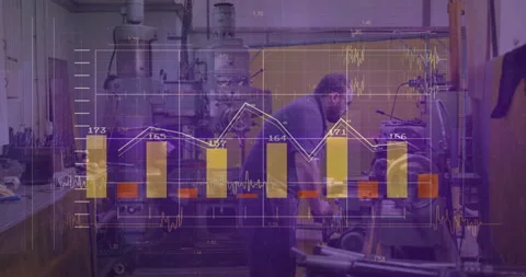 Graph and data analysis animation over workers operating machinery in factory Stock Footage 304842888