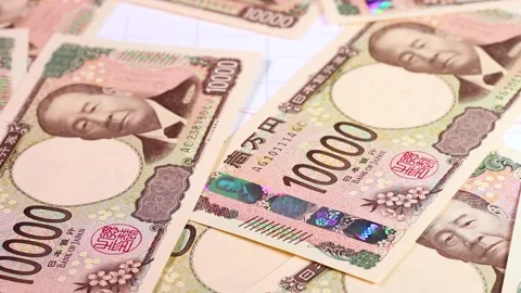 Graph and falling 10,000 yen bills Stock Footage 302690379