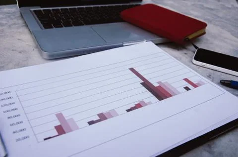 Graph and laptop Stock Photos