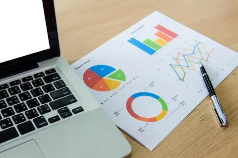 Graph and laptop Stock Photos