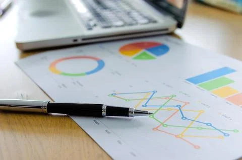 Graph and laptop Stock Photos