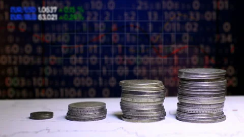 Graph and rows of coins for finance and business concept Stock Footage 88730985