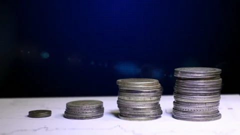 Graph and rows of coins for finance and business concept Stock Footage 88731102