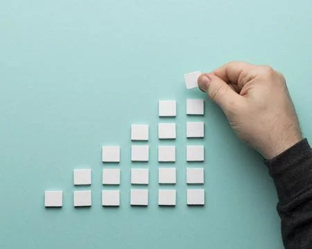 Graph made with white small cards Stock Photos