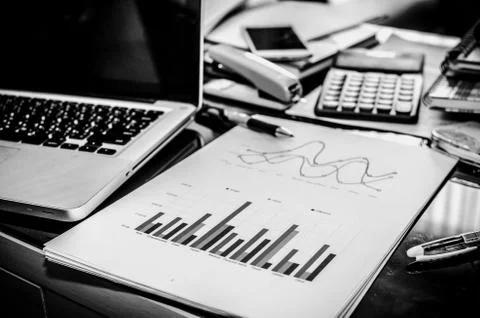 Graph paper and computer Stock Photos