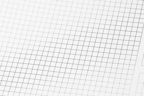 Graph paper checkered texture on an angle with a pattern of gray checkers l.. 스톡 사진