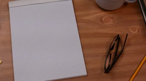 Graph Paper Notebook In Workspace 스톡 동영상 46624995
