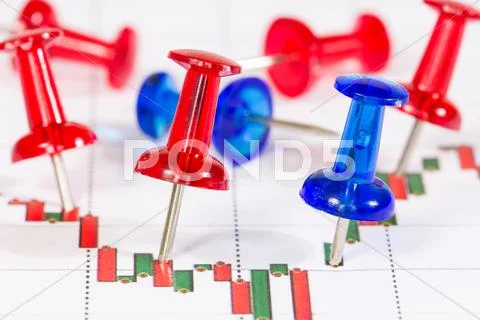 Graph with red and blue push-pins Stock Photos