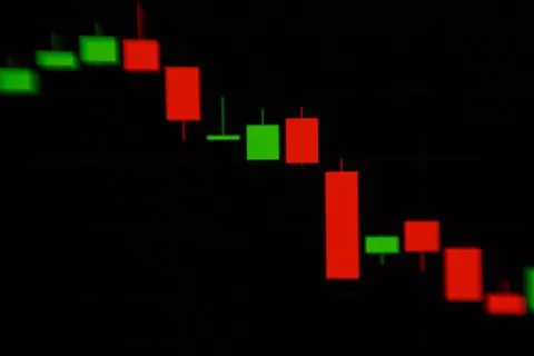 Graph on the stock exchange in red and green colors on the phone. photographed Stock Photos
