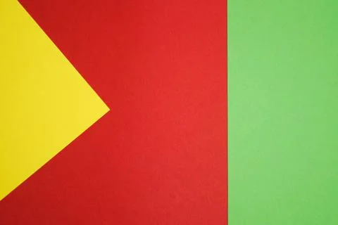 Graphic background of different geometric shapes in 3 colors: green, yellow, red Stock Illustration