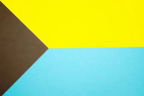 Graphic background of different geometric shapes in three colors: blue, yellow Stock Illustration