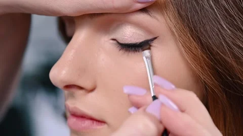 Graphic bright arrows on eyelids Stock Footage 257205443