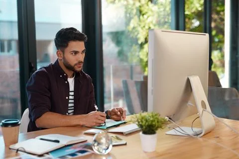 Graphic designer, computer and man with a drawing pen at desk while online for Stock Photos