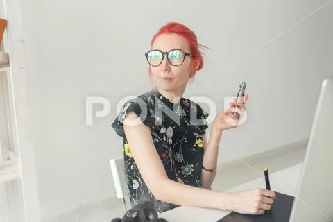 Graphic designer concept - Female graphic designer working on computer while Stock Photos