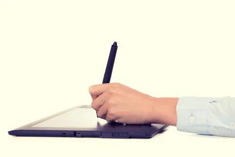Graphic designer hand using digital tablet pen and computer Stockfoto's