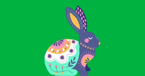 Graphic designer placing rabbit graphic on transparent background using floral Stock Footage 317479834