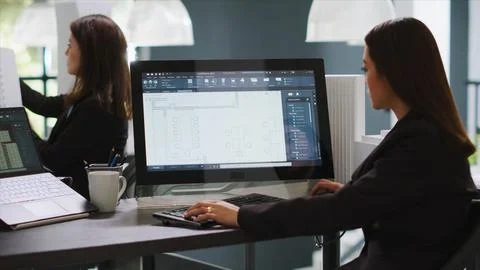 Graphic designer using CAD tool to create layout sketch 写真素材