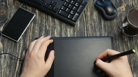 Graphic designer using digital tablet Stock Footage 58609576