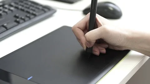 Graphic designer using drawing tablet Stock Footage 76195965