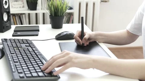 Graphic designer using drawing tablet Stock Footage 76195988