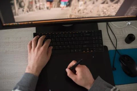 Graphic designer at work top view Young graphic designer working on a digi... Foto stock