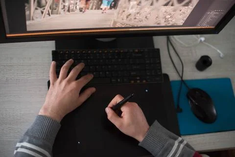 Graphic designer at work top view Young graphic designer working on a digi... Stock Photos